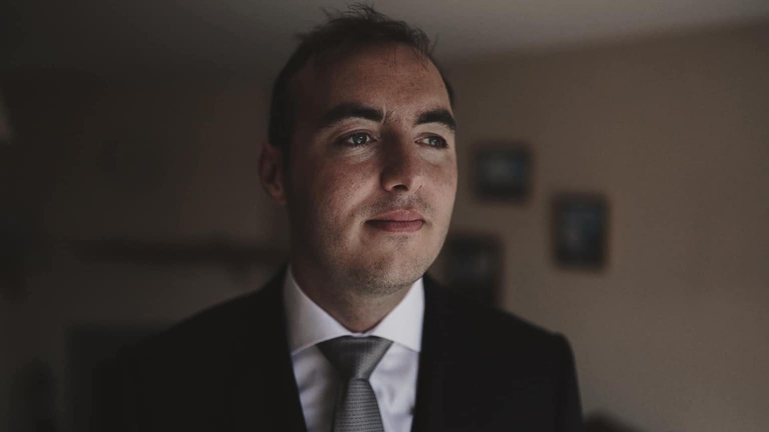 Contemplating groom.
