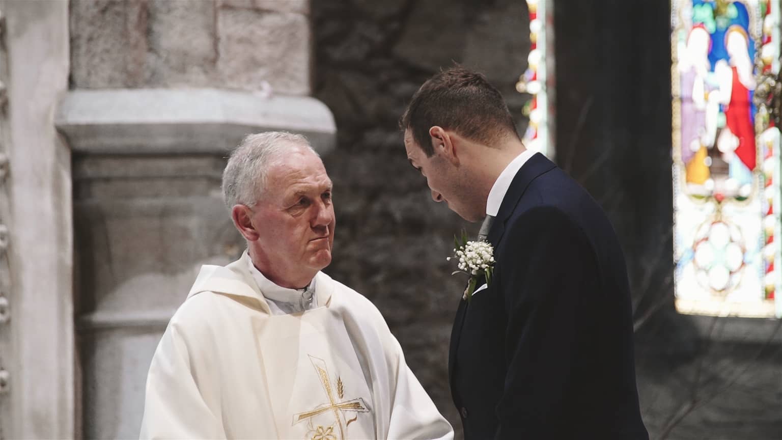 Priest is making final word to groom.