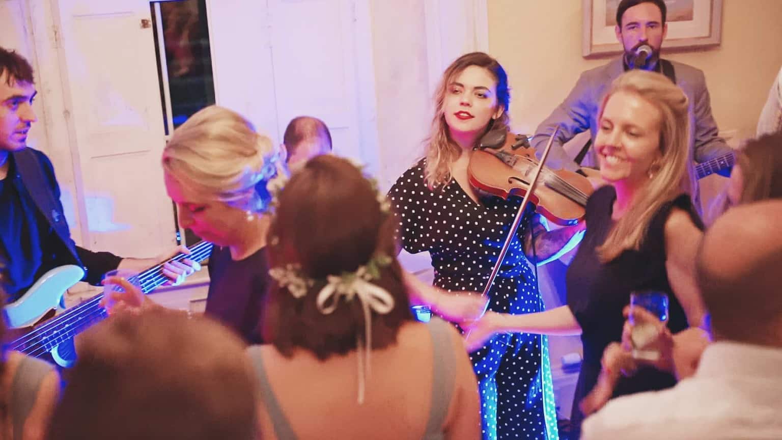 Woman is playing on violin