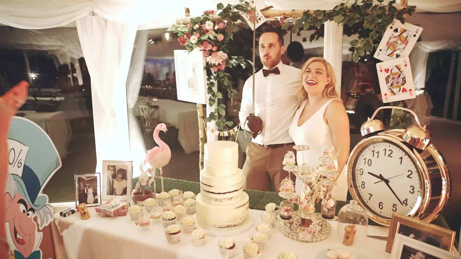 bride and groom is cutting wedding cake in cloughjordan marque