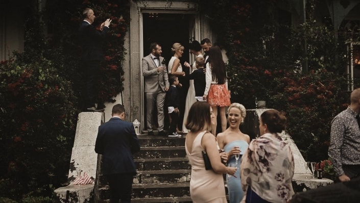 Happy people talking and drinking prosecco