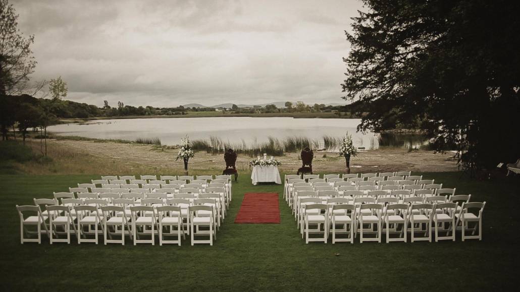 Wedding chair before ceremony in Ashley Park wit view at the lake