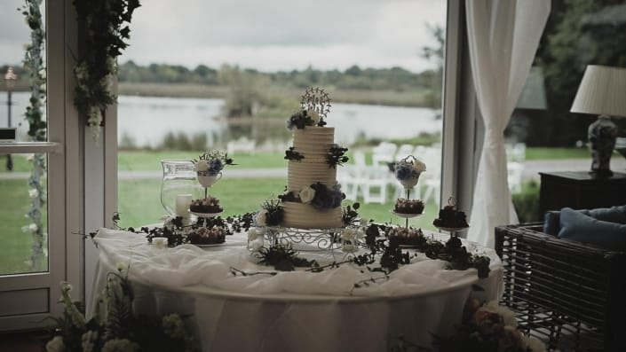 wedding cake with lake view at the back