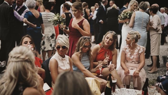 Talking wedding guest in Ashley Park