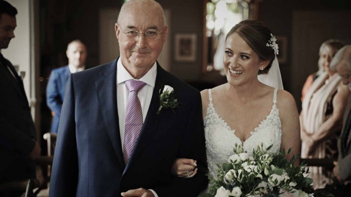 Bride walking down the aisle with Father