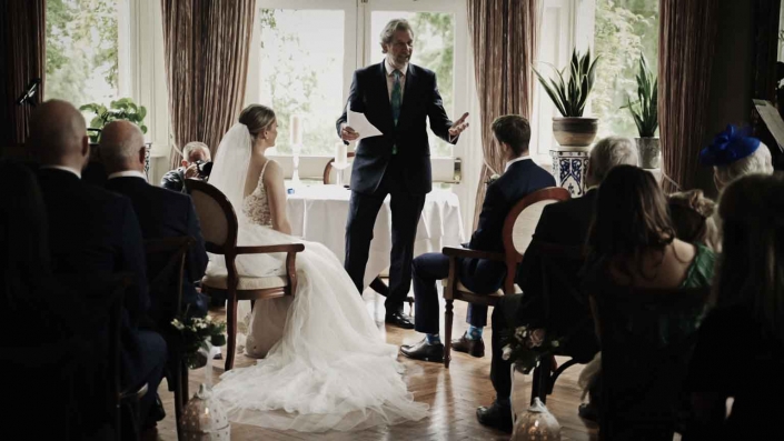 Celebrant talking to newly couple