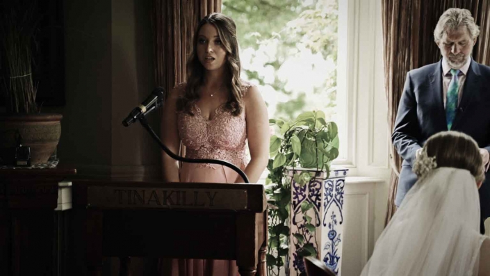 Bridesmaid readings love poem during ceremony