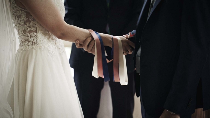 Tiding ribbons on hand