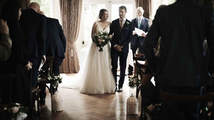Bride with Groom walking down the aisle