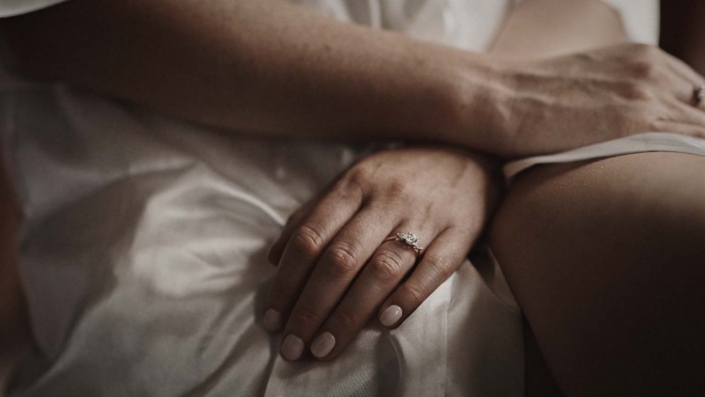 wedding rings on bride hand