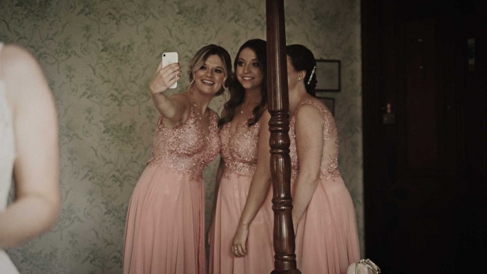 Bridesmaid selfie instead of helping to Bride