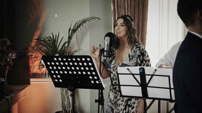 Singer sinning song for arrival of bride