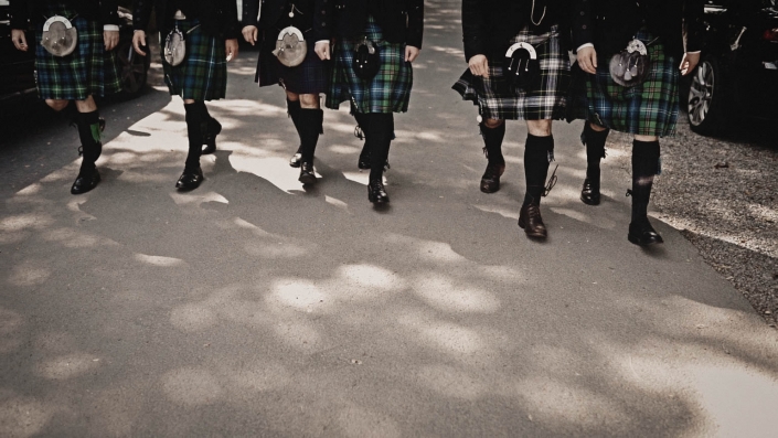 Scottish groom walking to ceremony