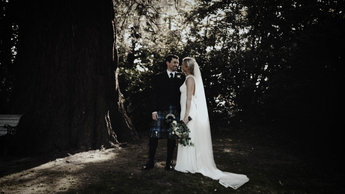 wedding picture inside of wooden area in tinakilly