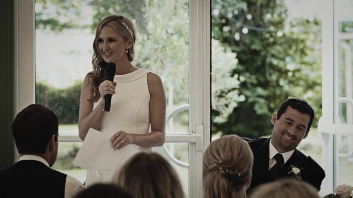 bride speaking to guest