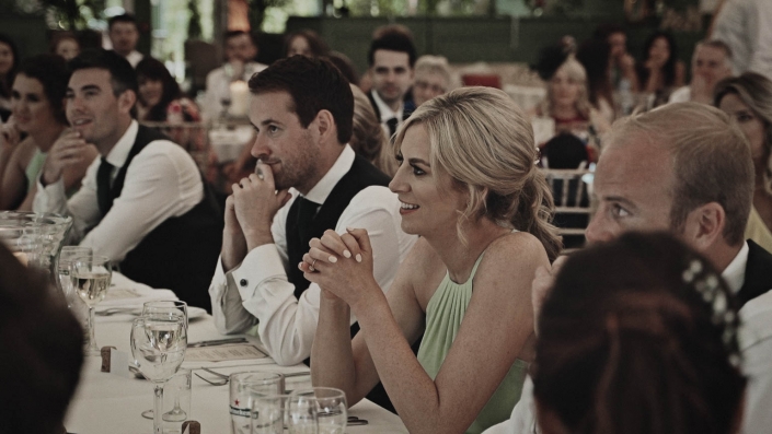bridesmaid is listening the speech