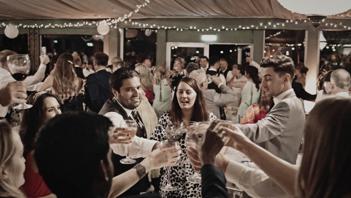 wedding toast with happy people