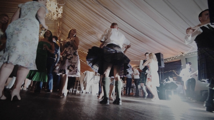Scottish man in kilt is dancing at Tinakilly House