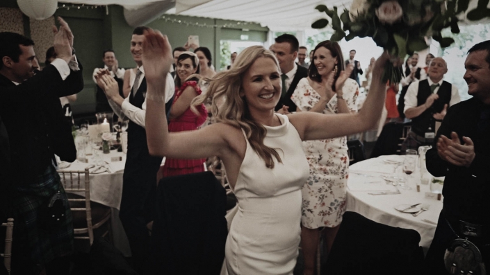 bride happily entering the room