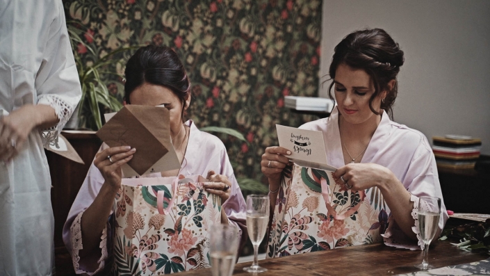 Bridesmaids is reading gift card.