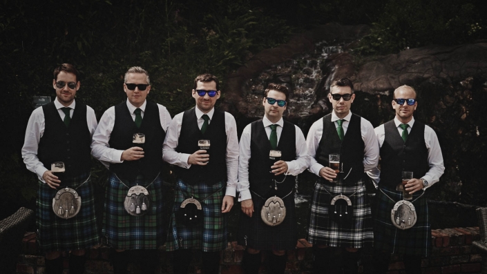 Groom with best men posing to picture