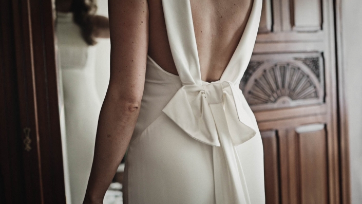 Ribbon placed on back of wedding dress