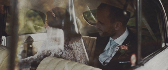 wedding video of couple inside car