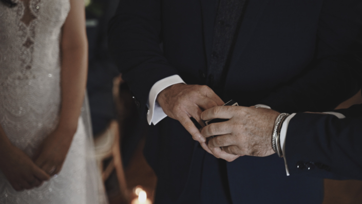 best man is giving wedding rings