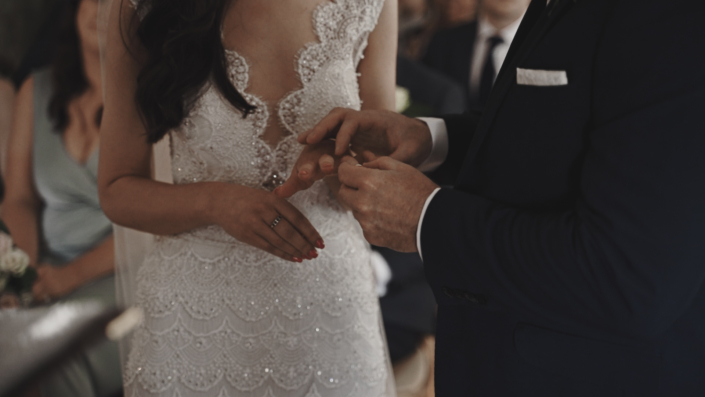 groom exchange wedding rings