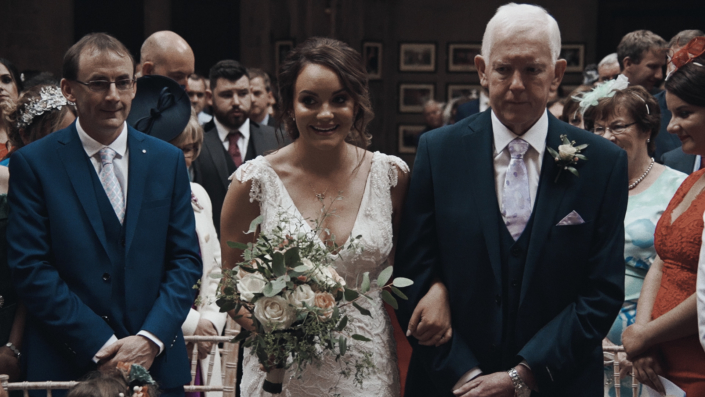 Alison walking down the aisle.