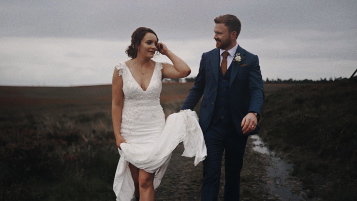 Bride wit groom walking.