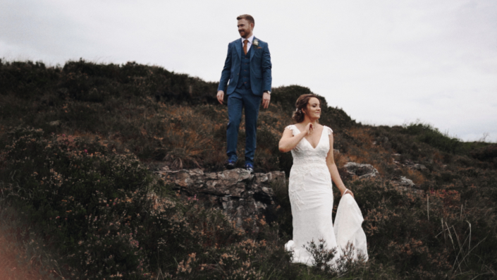 Bride and Groom posing to picture on Irish nature