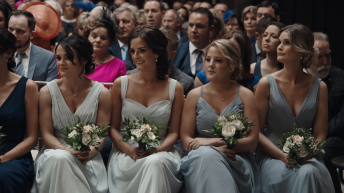 Bridesmaids during ceremony.