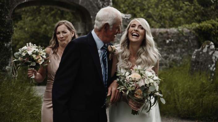 bride with father before ceremony