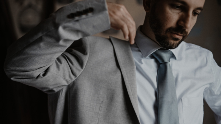 Andre is putting suit