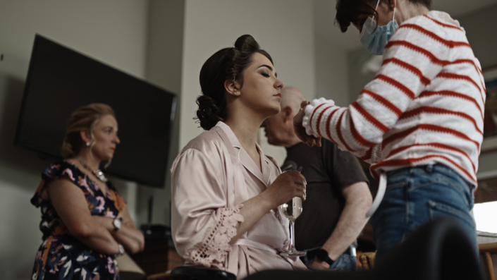 bridesmaid doing make up