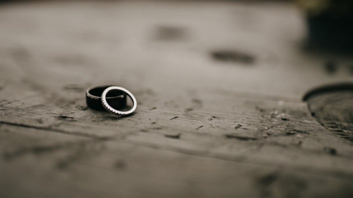 wedding rings on wood